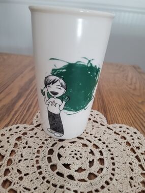 Starbucks White Ceramic Tumbler with Green Splash and Cartoon Figure